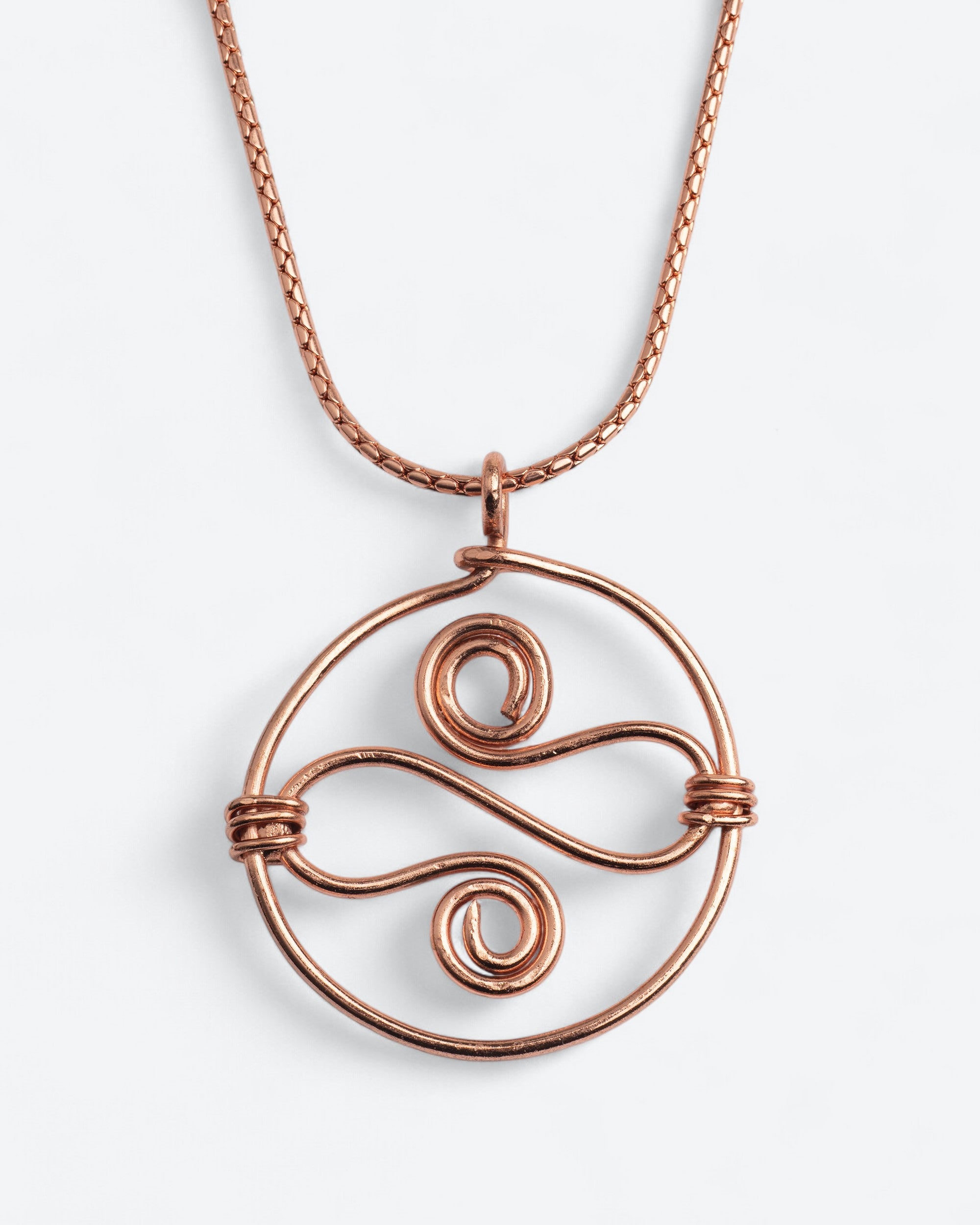 Koperen Fantasie Ketting - Ronde Hanger met Krulvormen