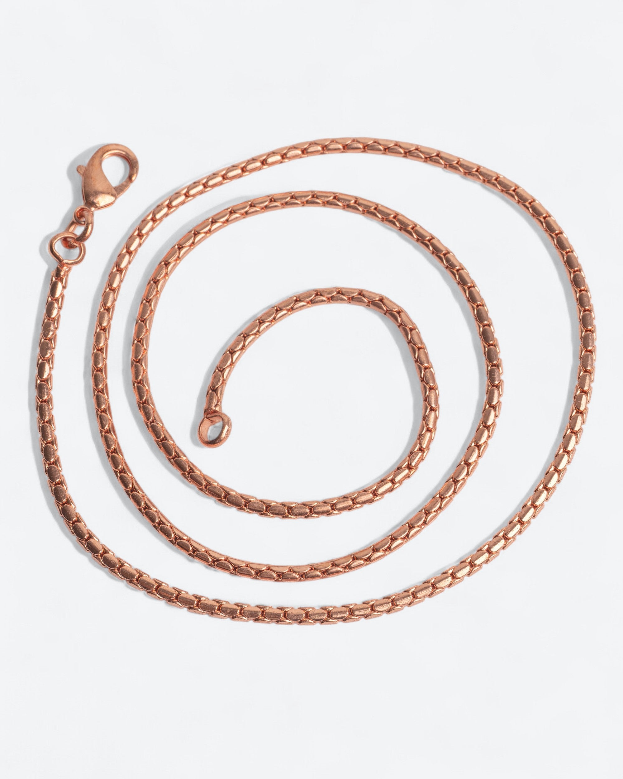 Koperen amulet ketting - Krul patroon