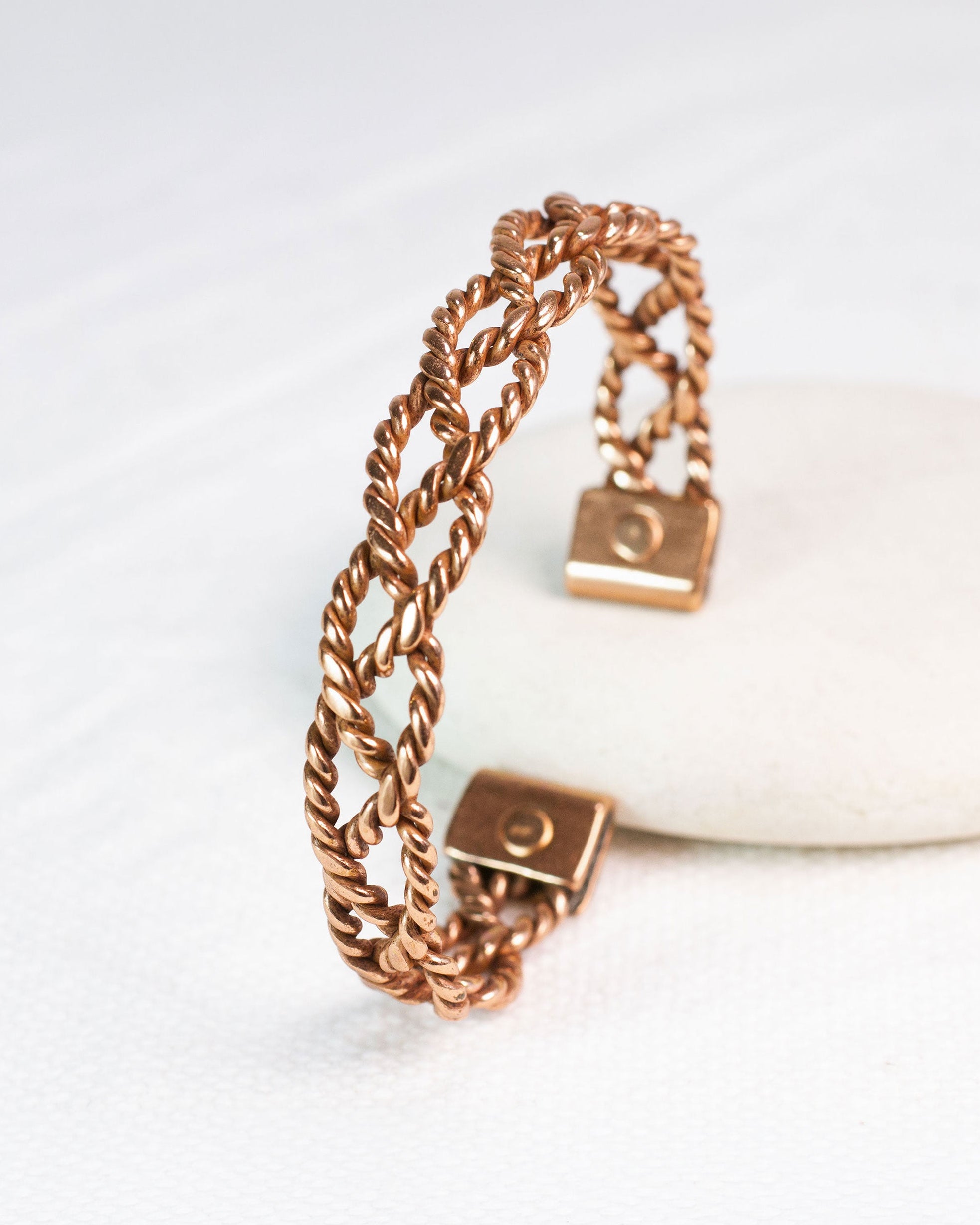 Koperen armband gevlochten