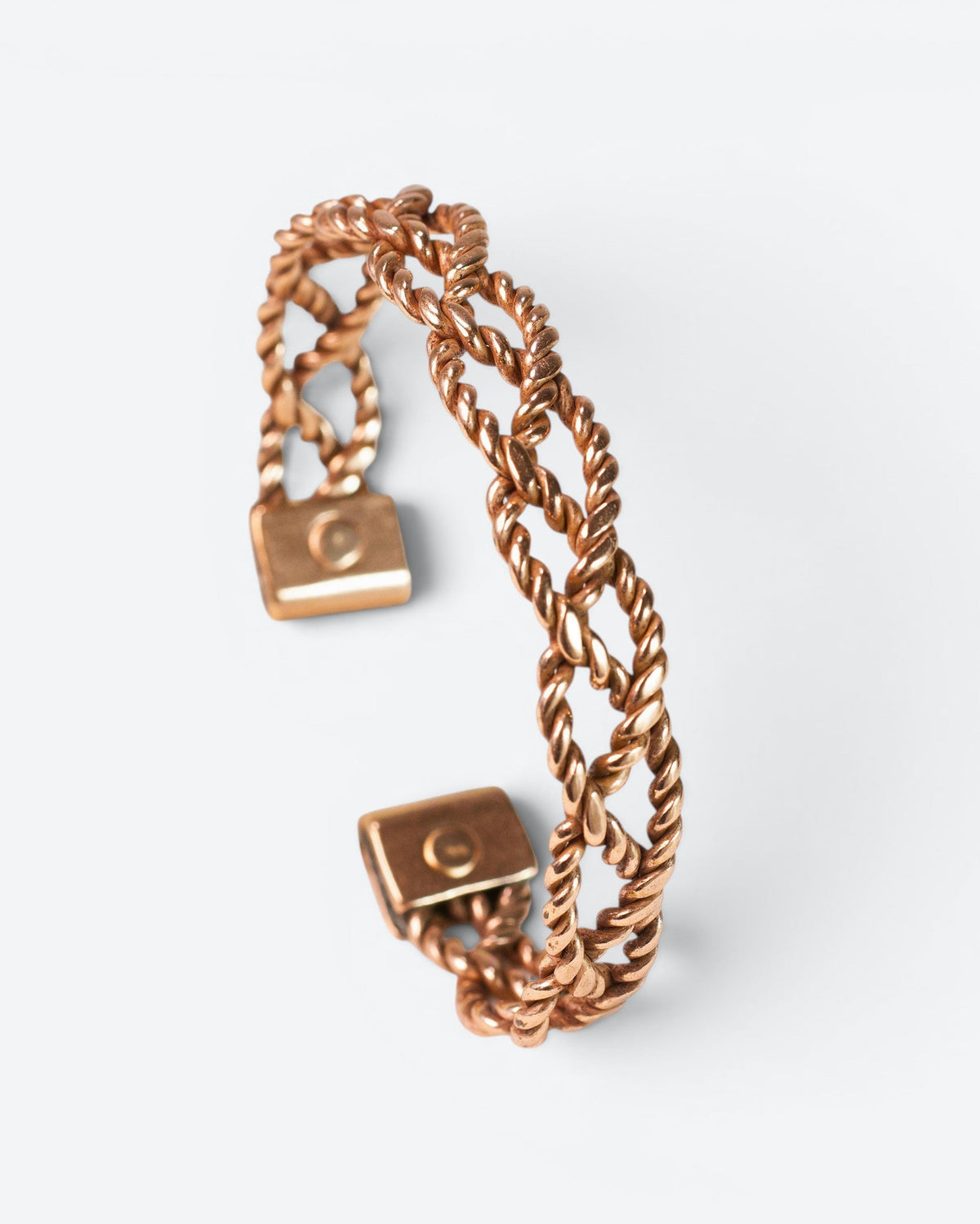 Koperen armband gevlochten