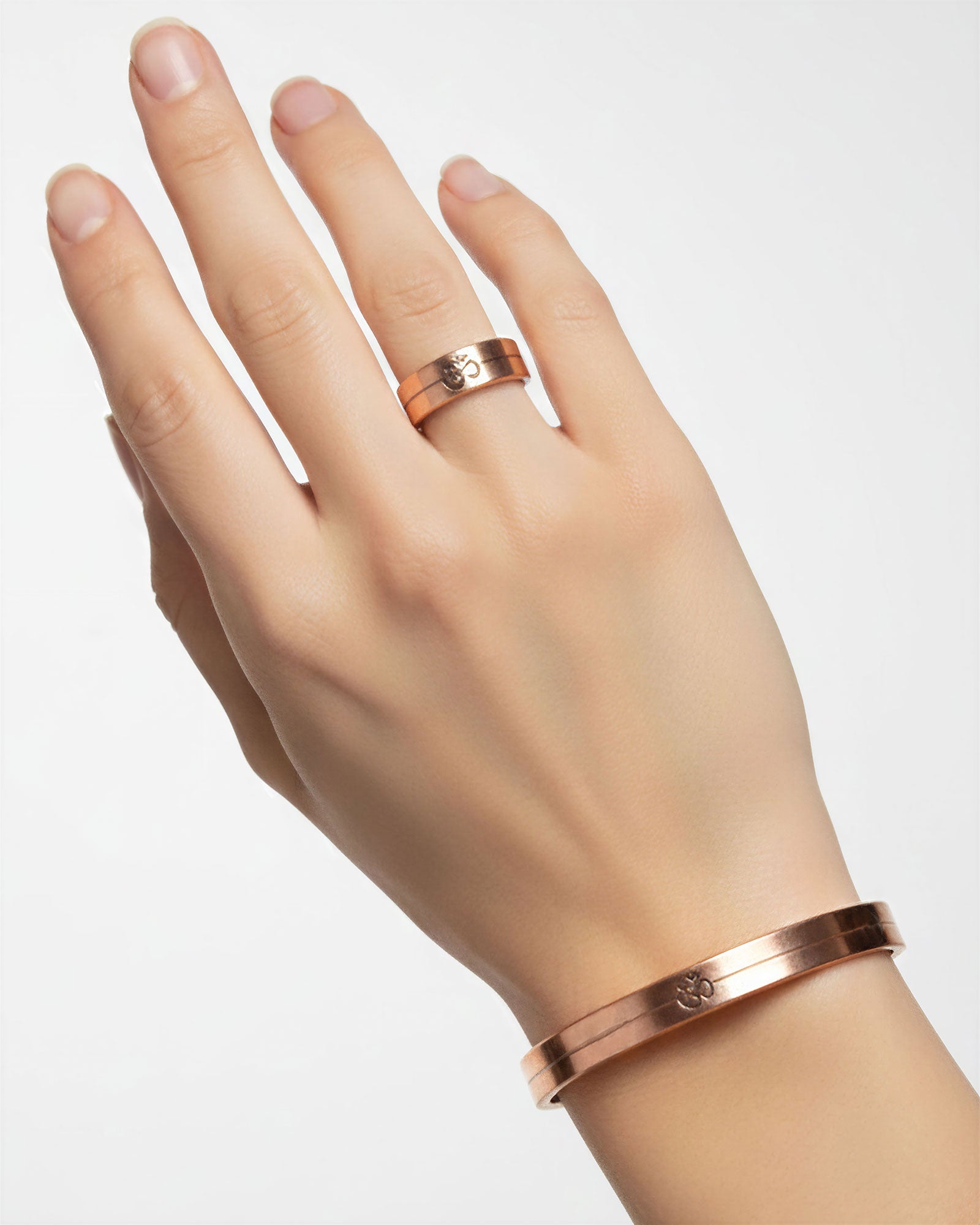 Set koperen magneet armband & ring - Om symbool